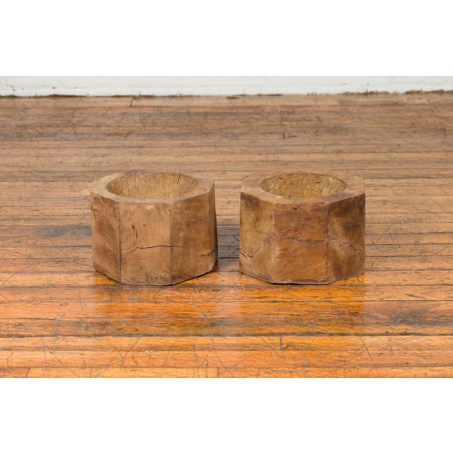 An antique Indonesian rustic octagonal wooden planter made from a tree trunk, two available, priced and sold individually....