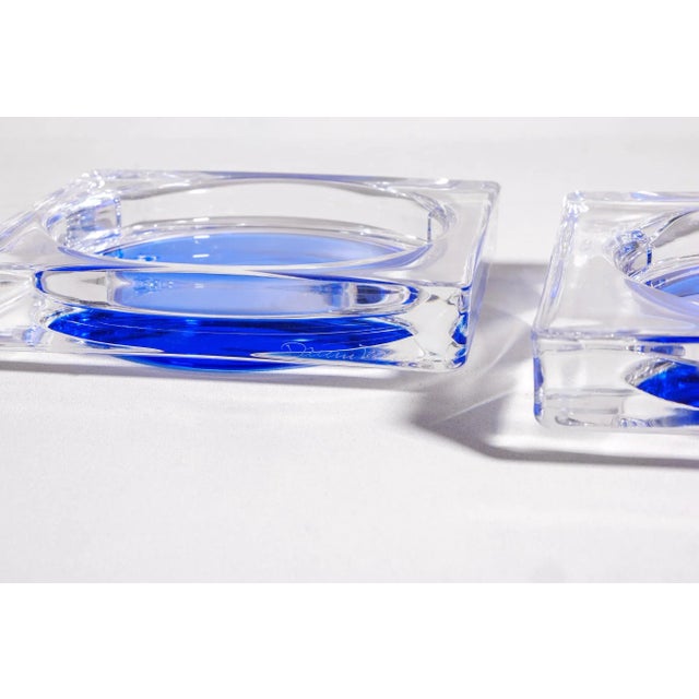 Splendid crystal and blue glass trays or centrepieces, by Daum France, both signed. This piece has an attribution mark, I...