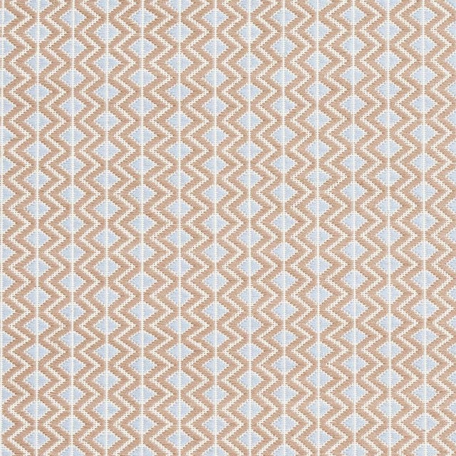 This small-scale geometric is handwoven by master Maya craftsmen using centuries-old techniques for a graphic sensibility...