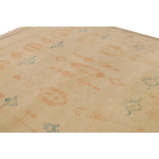 Handknotted in wool, an 8×10 mid-century Oushak rug joining Rug & Kilim’s Antique & Vintage collection. Originating from...