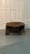 A rustic, Brutalist walnut coffee table from the early 20th century, characterized by its simple lines, solid structure,...