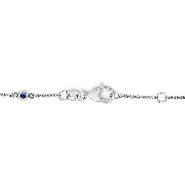 Embrace elegance and sophistication with this exquisite 14K white gold bracelet, beautifully rhodium-plated for added...