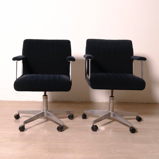 Beautiful pair of swivel, adjustable desk chairs in the Osvaldo Borsani style, dark blue velvet. Dimensions: Height 87 cm...