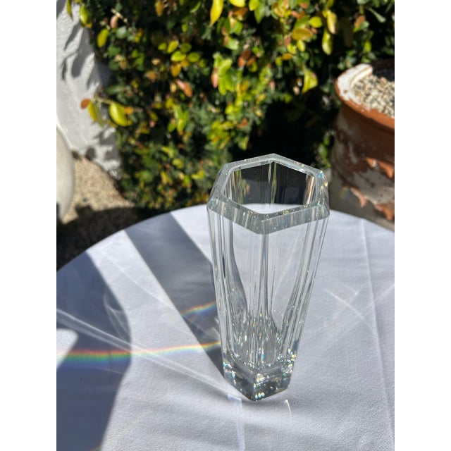 Vintage Kosta Boda “Colonna” crystal vase featuring a tall, faceted column form with a softly beveled rim. The clean...
