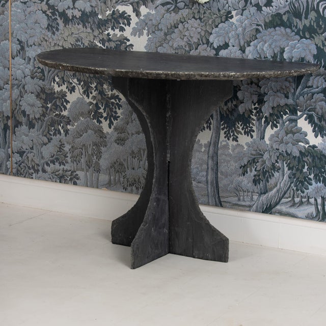 A beautiful slate demilune table from the Ardennes region of France made in 3 parts with an interlocking base. Excellent...