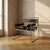 A vintage b3 wassily chair designed by marcel breuer, featuring a tubular chrome-plated steel frame and black leather...