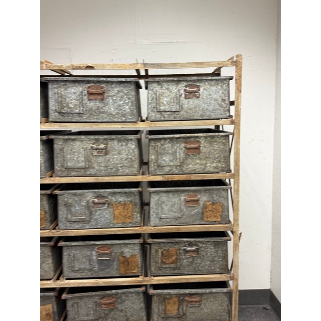 Design Plus Gallery presents Sangham Storage Bins + Frame on Casters. The bins themselves are made of galvanized metal...