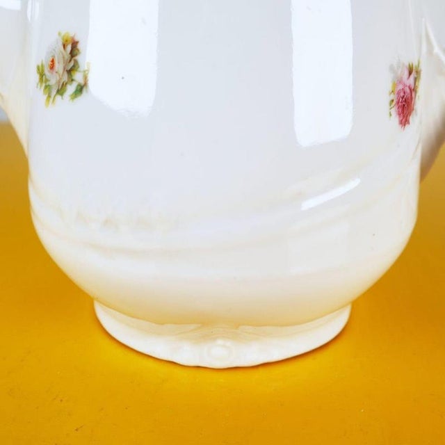 This refined teapot by ginori represents a perfect example of italian craftsmanship, crafted from fine porcelain and...