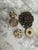 Vintage set of five upcycled vintage jewelry pieces converted to magnets. Eclectic pearls and beaded clusters add a little...