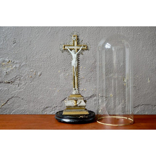 This very pretty blown glass bell with gold edging and blackened wooden base is also called a clock globe or wedding...
