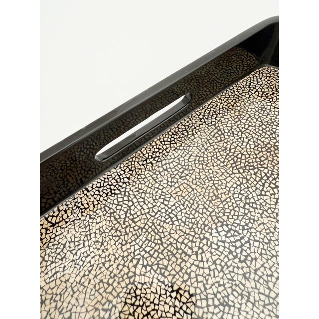 Contemporary, circa late 20th century eggshell and lacquer tray in an Art Deco style reminiscent of work produced by famed...