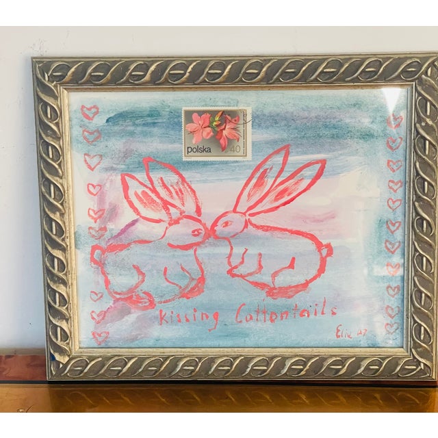 Original mixed media sketch Kissing Cottontails from Moon Bunnies series by Elia on cardboard. Framed silver frame.