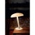 An adjustable table lamp in milk white Murano glass designed in 1978 by Carlo Moretti. Two x 60 watt incandescent bulbs,...