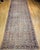 This exceptional mid-19th century Caucasian Karabagh gallery rug features one of the rarest and most coveted field colors...