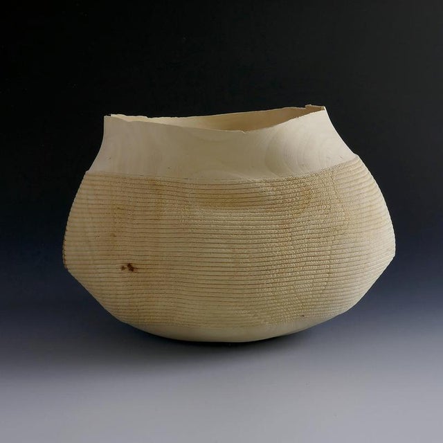 Ovalie Vase in Fig Tree Wood by Yann Marot Dimensions: D 33 x W 22 x H 24 cm Materials: Fig tree