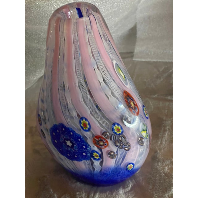 This Murano Millefiori Art Glass Vase attributed to designer Anzolo Fuga is a rare and visually stunning piece that...