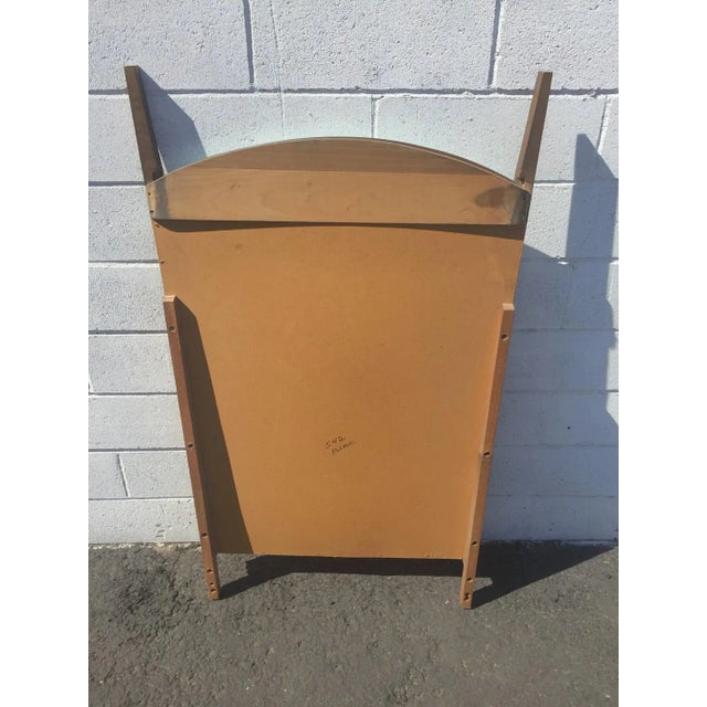Very Nice Mid Century Modern Wall Mirror Set in a walnut frame with a classic mid century shape and design. Shows normal...