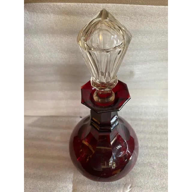 This is a beautiful vintage decanter in excellent condition. Ruby Red Glass Decanter Bottle / Clear Stopper 13" tall with...