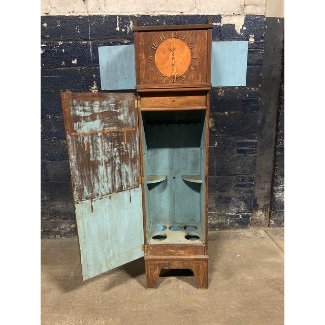 Here is a unique Arts & Crafts quarter sawn oak floor clock with several cabinet spaces and a single drawer. It features a...