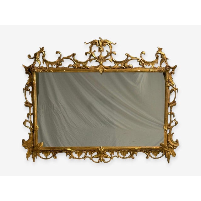 Friedman Brothers, Chinese Chippendale, Large Ornate Wall or Console Mirror, Giltwood, Mirror, USA, 1950s A chinese...