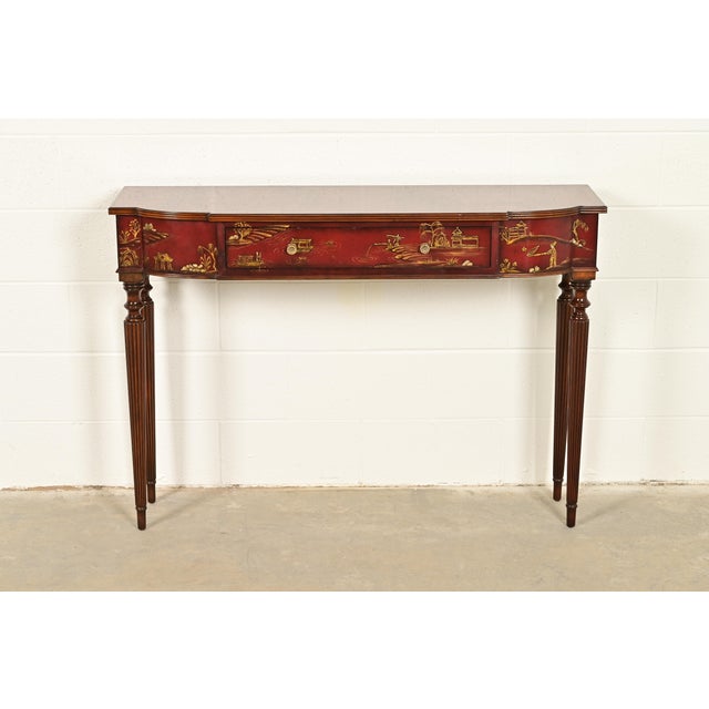 A gorgeous English Regency or Louis XVI Chinoiserie console table By Maitland Smith USA, Circa Late 20th Century Red...