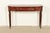 A gorgeous English Regency or Louis XVI Chinoiserie console table By Maitland Smith USA, Circa Late 20th Century Red...