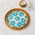 This set of two round trays is hand-woven by Vietnamese craftsmen and framed with natural rattan. The surface is inlaid...