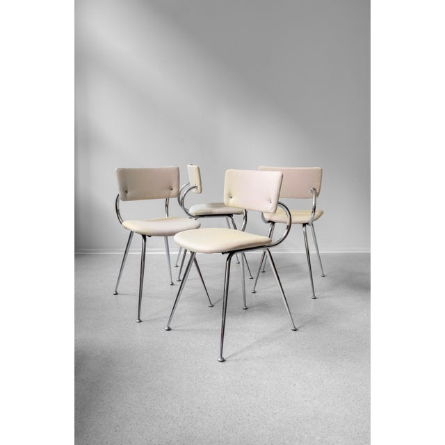 Interesting dining chairs sourced in Italy. Reupholstered with new fabric. The fabric is made of 100% recycled polyester...