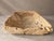 A striking antique onyx stone bowl, handcrafted into a sculptural decorative vessel that showcases the timeless beauty and...
