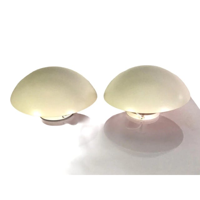 The PH-Hat Sconce by Poul Henningsen for Louis Poulsen, Denmark in 12 inches diameter size. An articulated shaded wall...