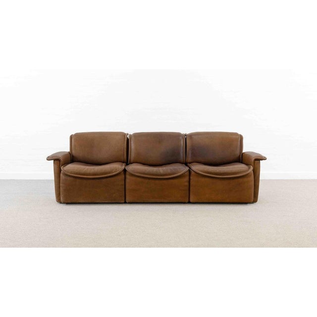 Modular sofa from the 1970s. Model DS-12 by DeSede, Switzerland. Upholstered in original brown/cognac-colored buffalo...