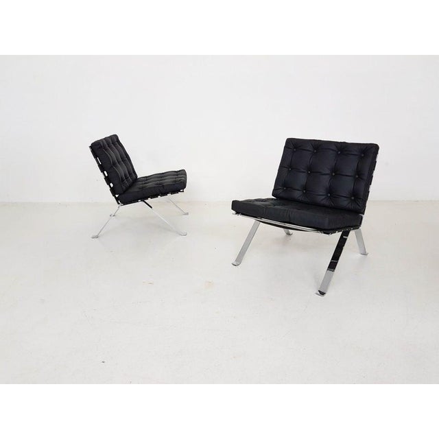 Set of 2 lounge chairs model Euro 1600 by Hans Eichenberger for Girsberger Reupholstered in black leather, new cushions....