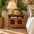 Distinctive vintage 1970s nightstand by Henredon, featuring a warm wood finish and a pair of decorative pierced-carved...