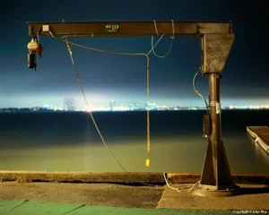 Contemporary Night Photograph "Small Boat Winch" by John Vias