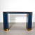 Sculptural Egyptian blue faux wrapped snakeskin and brass console table attributed to Karl Springer. A great example of...
