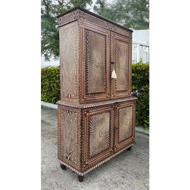 Superb 19th-Century Anglo-Indian Rosewood Cabinet, Intricate Ebony Inlay Offered for sale is a superb and finely carved...