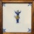 A charming mid-20th-century framed tile panel by Tichelaar Makkum, composed of three hand-painted Dutch ceramic tiles...