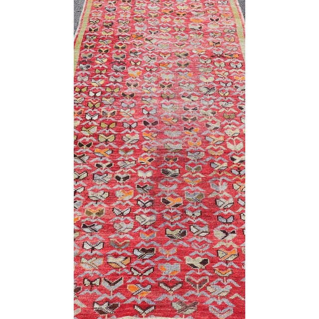Colorful Vintage Konya rug in Red Acid Green, Orange Measures: 4'0" X8'10" Vintage Turkish Konya Runner With all over...