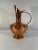 A superb French hand crafted hammered pitcher from Villedieu in Normandy France. Circa early 1900s. Makers mark on the...