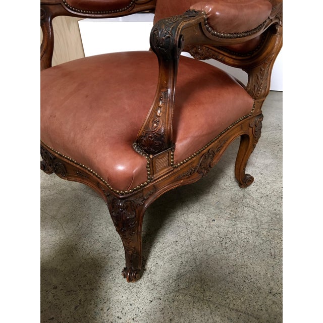 Pair Louis XV Style Hand Carved Walnut Distressed Leather Lounge Chairs