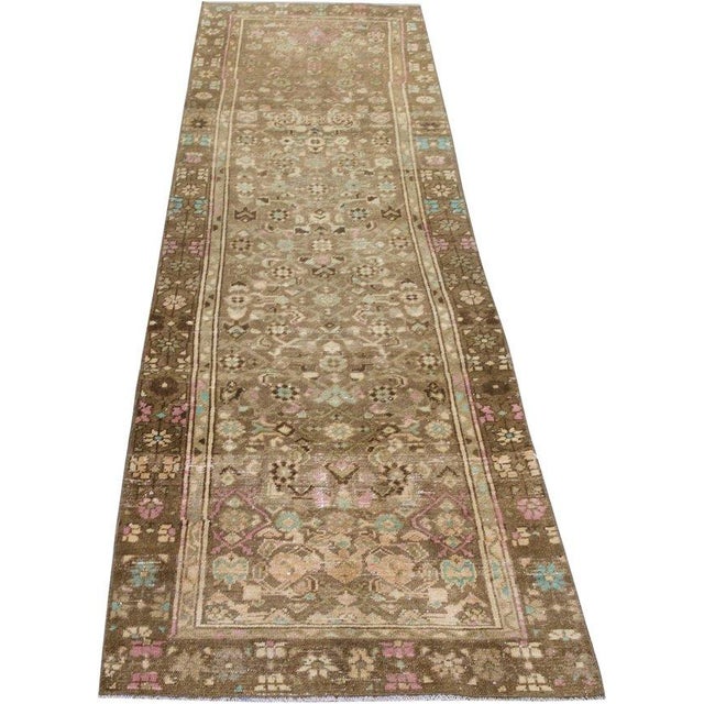 Hand-knotted with care using traditional rug-making techniques, this wool rug blends timeless craftsmanship with a modern...