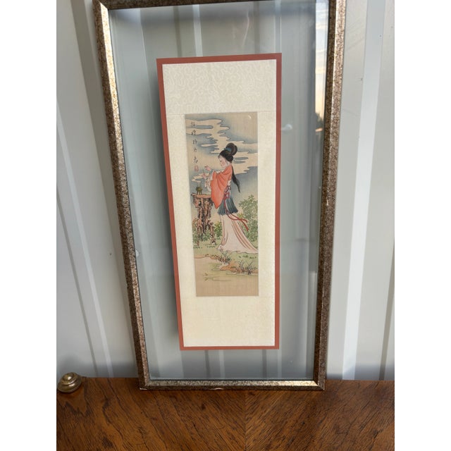Beautiful vintage framed picture of a traditional Chinese Geisha girl burning incense. She is wearing traditional robes in...