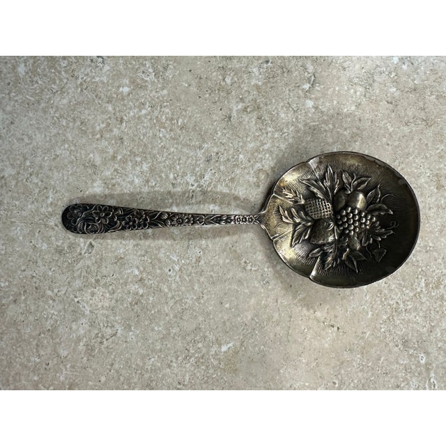 Solid Bon Bon Spoon 5 1/8” Repousse (Sterling, 1828) by KIRK STIEFF S. Kirk & Son sterling silver berry spoon, likely from...