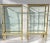 This Exquisite and Parisian Chic pair of double-sided brass and glass display cabinets beautifully fuse sophistication and...