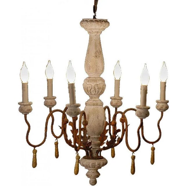 Hand-Carved Turned Wood Chandelier Overall measurements (inches) 29H x 26W x 26D. Dramatic and beautifully crafted, this...