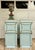 This striking pair of antique pedestal cabinets has been newly refinished in a beautiful satin, robin’s egg blue with...