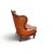 Exceptional antique Chesterfield wing chair dating to approximately 1910, featuring high-quality cognac brown leather,...