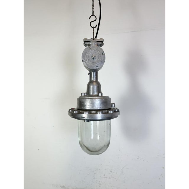 - Vintage Industrial factory light from the 1960s - Made in Ukraine in former Soviet Union - Cast aluminium body - Clear...