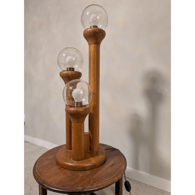 My parents purchased this table lamp new from a boutique in San Francisco in the late 1970's. It is a vintage honey oak...