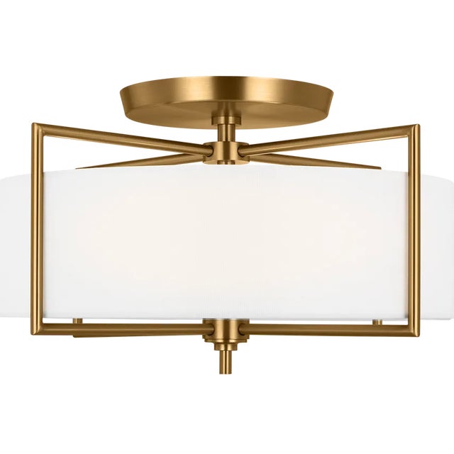 The Perno three-light flush mount in Burnished Brass by Chapman and Myers was inspired by a vintage mid-century French...